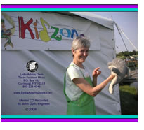 Lydia with dolphin puppet